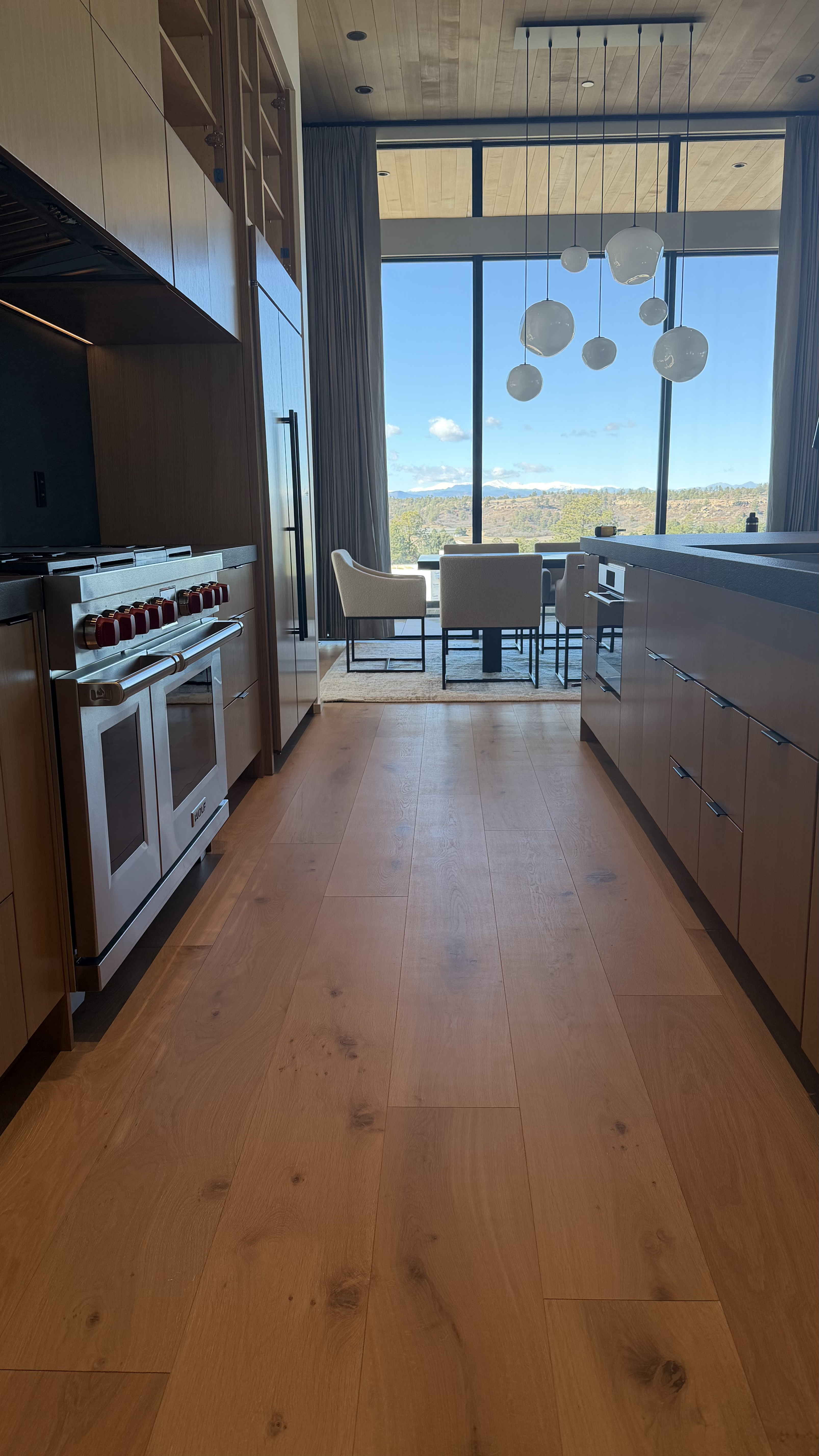 Engineered wide-plank hardwood in a Castle Pines home